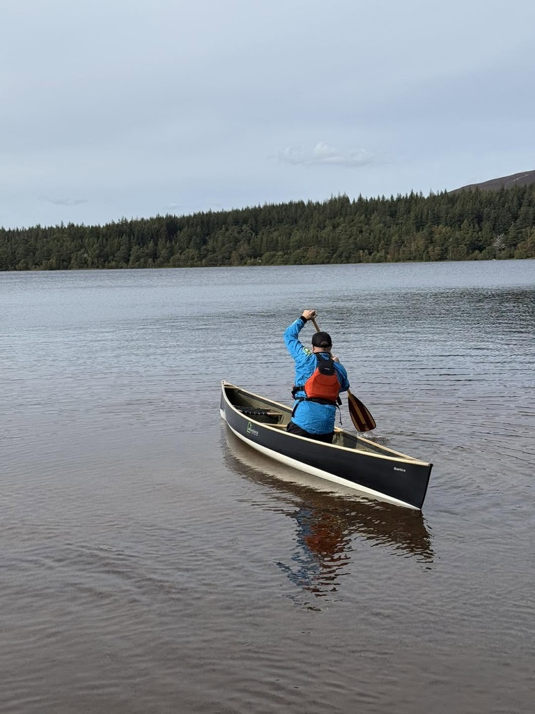 Quetico 15 Composite on calm waters